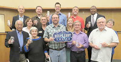 Joined by members of the community, former city council members and city staff members, the Buda City Council in September celebrated an earlier announcement that Deep Eddy Vodka was planning to open a new facility in the city. Last week, an agreement was finalized securing Deep Eddy’s move to Buda. (photo by Moses Leos III)