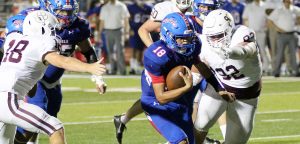 Rebs hold off Tigers in 35-34 thriller