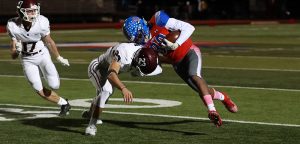 Rebel football goes Green in 69-36 win over Austin