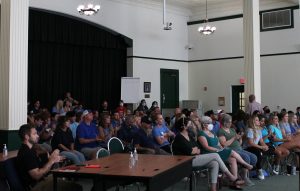 With shouts and murmurs, Hays parents argue over masks, events