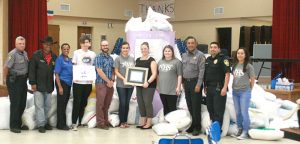Hays High students collect over 300 pillows for domestic violence victims