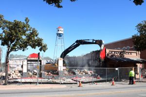 Burnt downtown building demolished