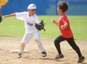 Players learn fundamentals at annual Lobo baseball camp