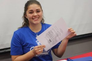Signing Day at Hays CISD: Hays and Lehman athletes make their choices