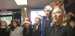 Rebel Jazz choir group spreads holiday cheer