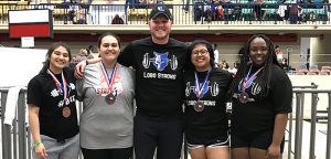 Lobo powerlifters share the podium