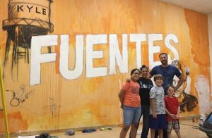 Fuentes parent leads artists in mural honoring school namesake