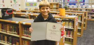 Buda youth receives Red Cross medal for lifesaving efforts
