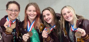 Lady Tigers swim team earns bronze