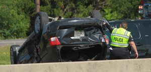 Authorities seek man who fled I-35 rollover wreck