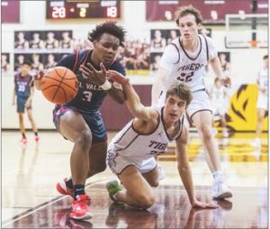 Tigers win as district play winds down