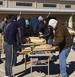 DSHS students, moms build beds for children in need