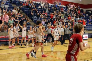 Wimberley wins 67-65 in thriller