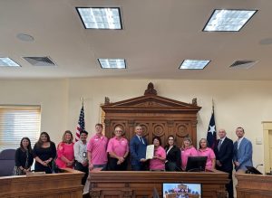 Commissioners go pink for breast cancer